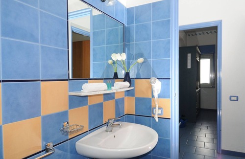 Province of Messina House | Vacation Home "Oasi Azzurra - Bilocale Plus 2" with Sea View, Shared Pool & Shared Terraces