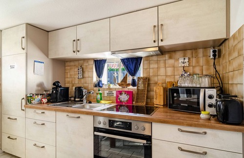 Rysum House | Vacation Home 'Segelboot' with Garden, BBQ & Wi-Fi