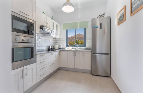 Ajuy House | Vacation Home 'Ternemoyschool' with Mountain View, Private Terrace and Wi-Fi