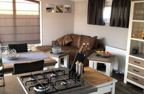 Renesse Ski Chalet | Vacation home with TOP equipment, only 8 minutes walk to the beach, dogs allowed