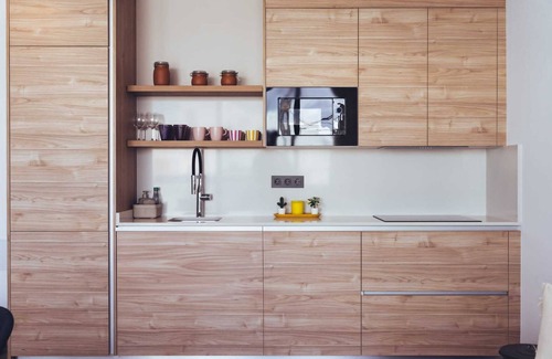 Caleta de Famara Apartment | Vacation 'Kay Lava' with Mountain View, Wi-Fi and Air Conditioning