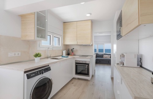 Playa Quemada Apartment | Vacation 'La Casa De La Playa' with Sea View, Wi-Fi and Air Conditioning