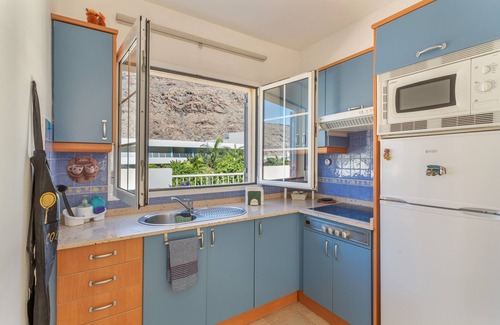 Lomo Quiebre Apartment | Vacation 'Los Mangueros Beach 6 - Mogán' with Mountain View, Wi-Fi and Air Conditioning