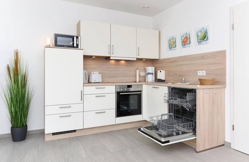 Neuharlingersiel Apartment | Vacation residence Deichgraf Gartenweg 4c Nr.1 - Deichgraf