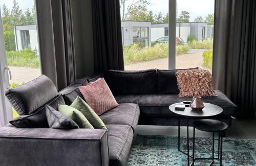 Scherpenisse Ski Chalet | Vakantiepark de Zeeuwse Parel - Noordzee Deluxe