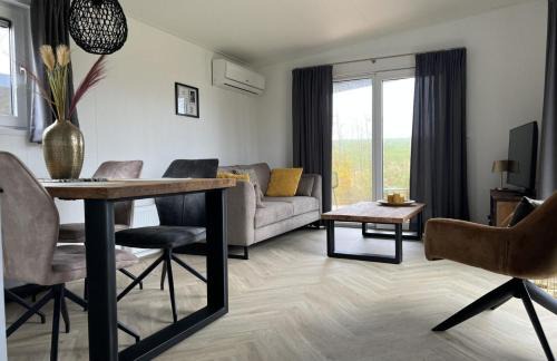 Scherpenisse Ski Chalet | Vakantiepark de Zeeuwse Parel - Dijkzicht