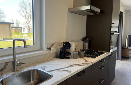 Scherpenisse Ski Chalet | Vakantiepark de Zeeuwse Parel - Parkzicht