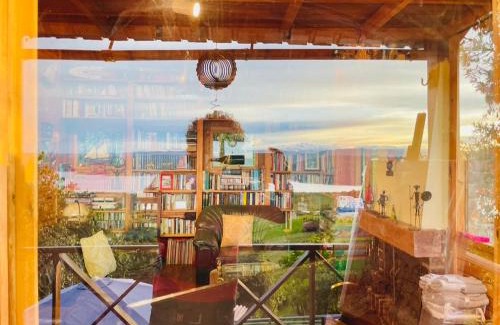 Sesquile House | Varsovia, casa de madera biblioteca