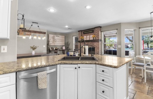 Enterprise House | Vegas Farmhouse Retreat: Waterfall Pool/Spa, Campfire, Sports Court & RV Access