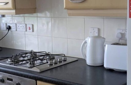 Baguley Apartment | Vibrant flat with lots of amenities near to Manchester Airport