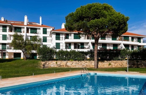 Quarteira Apartment | Vila Sol: Nice apartment with large south-facing terrace and view of own park