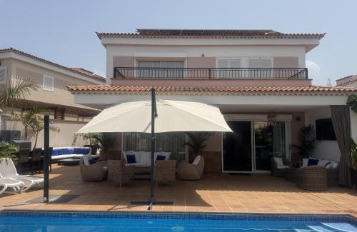 Puerto de Santiago Villa | VILLA BLOSSOM in the beautiful area of Puerto Santiago Tenerife with 5 bedrooms for up to 10 guests private swimming pool and many other activities to entertain the family Secure parking for 2 cars and disabled access throughout