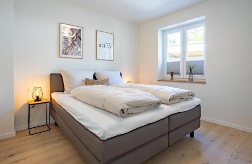 Timmendorfer Strand Apartment | Villa Dornkamp 1 - Luxuriöse Ferienwohnung für 4 Personen inklusive Sauna und Garten