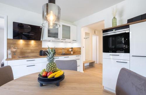 Timmendorfer Strand Apartment | Villa Dornkamp 1 - Luxuriöse Ferienwohnung für 4 Personen inklusive Sauna und Garten