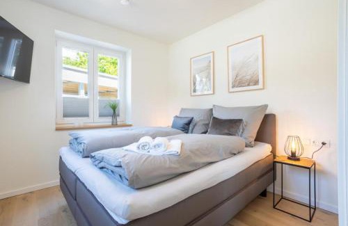 Timmendorfer Strand Apartment | Villa Dornkamp 1 - Luxuriöse Ferienwohnung für 4 Personen inklusive Sauna und Garten