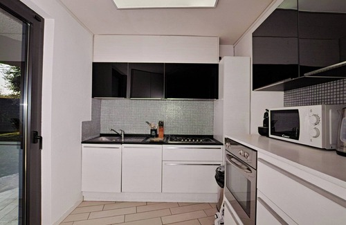 Manerba del Garda Villa | Villa "Grazia" with Wi-Fi, Garden, Terrace, Pool Gym & Sauna