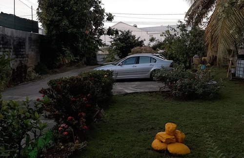 Petit-Bourg Villa | Villa Héliconia on garden level, between sea and mountains, close to shops.