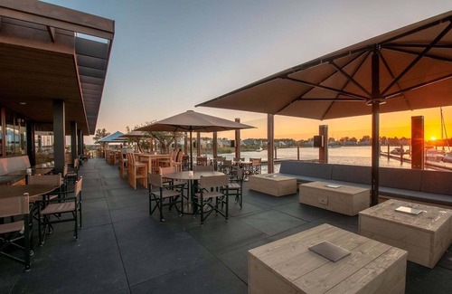 Tholen House | Villa in Netherlands with Waterfront Garden