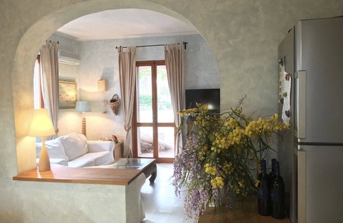 Santa Margherita di Pula Villa | Villa of Graces. White beach and emerald sea 40 meters from the garden