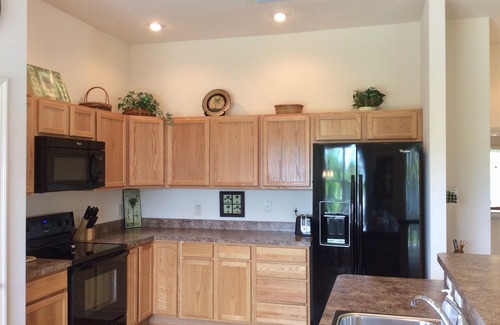 Charlotte House | Village of Charlotte Retreat: 3BR, 2BA Home, Golf Cart, & Dog-Friendly Bliss