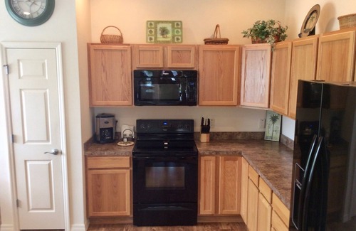 Charlotte House | Village of Charlotte Retreat: 3BR, 2BA Home, Golf Cart, & Dog-Friendly Bliss