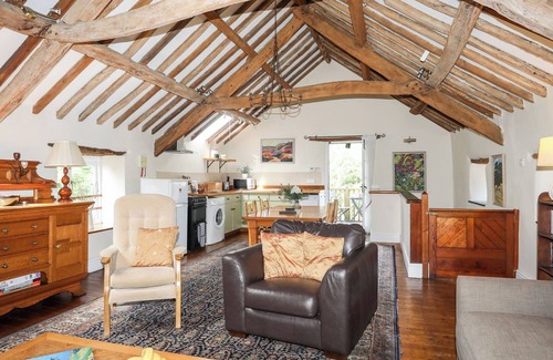 Gaerwen Cottage | VINE TREE BARN, pet friendly, with open fire in Pentre Berw