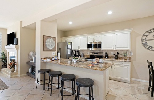 Kierland Apartment | Wake up in style at this modern 2BR, 2BA Scottsdale condo featuring a private patio, heated pool, jacuzzi, and fitness center. Enjoy gated walking paths to Kierland Golf Course and the Westin, plus easy access to dining, shopping, and entertainment.