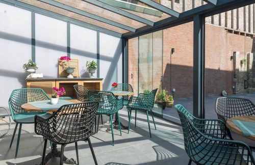 Centrum Apartment | Wake up in the heart of Tilburg in a cozy hotel bed that blends past charm with modern comfort