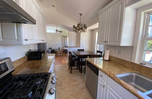 Crown Point Cottage | Walk to Beach, Parking Laundry AC & Patio, Classic & Comfortable Beach Cottage