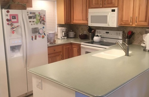 Capri Isle Condo | Walk to the Beach! Waterfront furnished condo in perfect location!