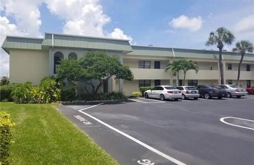 Capri Isle Condo | Walk to the Beach! Waterfront furnished condo in perfect location!