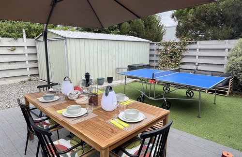 Jullouville House | Walking distance to beach and shops, family home with fully enclosed garden.