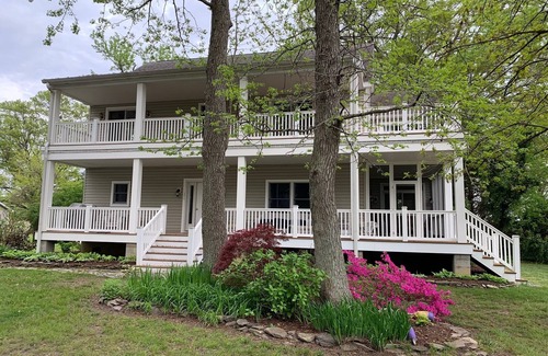 Claiborne House | WATCH THE EVER-CHANGING SUNSET REFLECT OVER THE EASTERN BAY