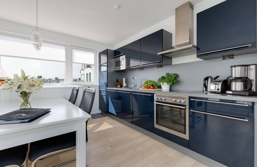 Olpenitz House | Water house "Klabautermann": Baltic Sea vacation with roof terrace & sauna - dogs allowed