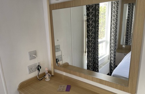 Hamworthy House | Water Lily lovely dog friendly caravan on Rockley Park, Poole Harbour + Sea View