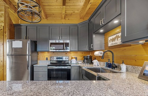 Gatlinburg - Pigeon Forge Cabin | Waterfall, Hot Tub, Fire Pit + 20 Mile View