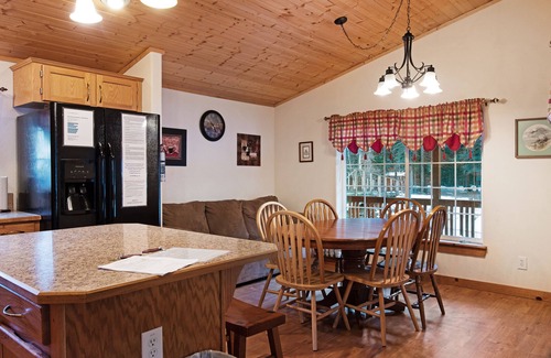 South Fork Cabin | Waterfront cabin with mountain view, wood stove, private hot tub, & WiFi