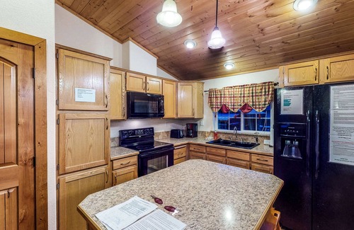 South Fork Cabin | Waterfront cabin with mountain view, wood stove, private hot tub, & WiFi