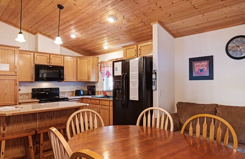South Fork Cabin | Waterfront cabin with mountain view, wood stove, private hot tub, & WiFi