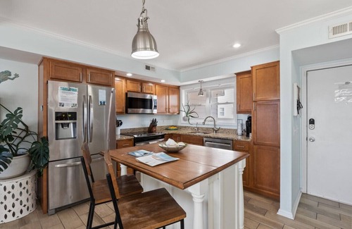 North Carolina Coast Villa | Waterfront Condo: Rosé All Day with Sunset Views