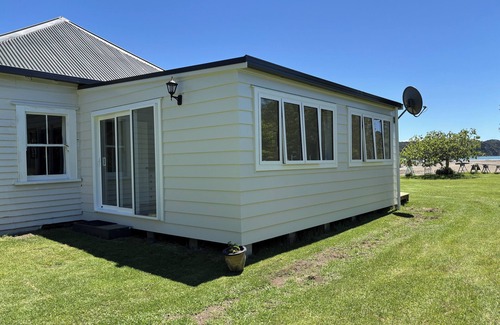 Russell House | Waterfront Historic Homestead in Clendon Cove with tidal boat ramp, EV charging
