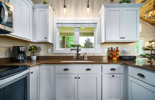 Two Rivers House | WATERFRONT Home-Amazing sunsets, extra amenities, kayaks, canoe, paddle board~