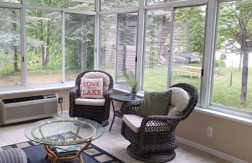 Lake Leelanau House | Waterfront home Lake Leelanau. Enclosed porch, WIFI. Canoe, row boat Dog ok.