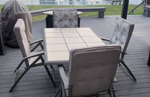 Rehoboth Beach House | Waterfront home with dock, gazebo, and fenced yard