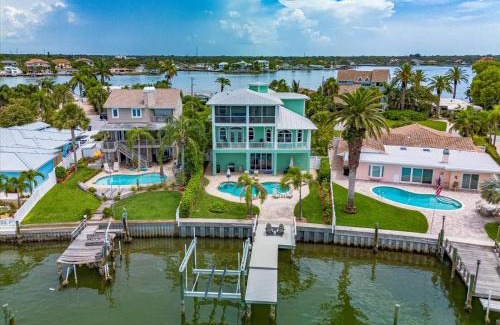 Indian Rocks Beach House | Waterfront Luxury w/Heated Salt Pool & Golf Cart