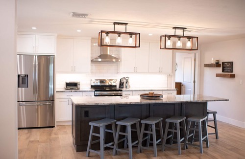 Yacht Club Villa | Waterfront luxury 4 bed 4 bath with large heated pool & dock