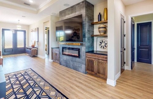 Southside Rural Community House | Waterfront modern home with pool & hot tub