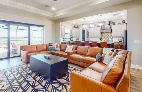 Southside Rural Community House | Waterfront modern home with pool & hot tub