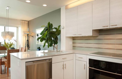 Telegraph Hill Condo | WATERFRONT PENTHOUSE. SPECTACULAR VIEWS, DECKS, PRIVACY, QUIET, PARKING, GYM.