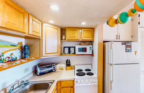 Atlantic Beach Condo | Waterfront suite with pool, beach access, Wifi & balcony